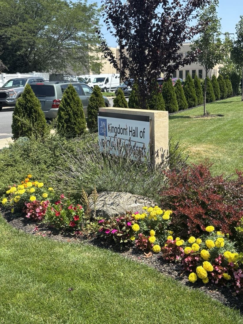 Colorful annual flower beds with lavender and shrubs